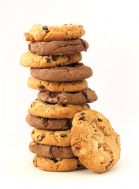 A stack of chocolate chip and hazelnut cookies